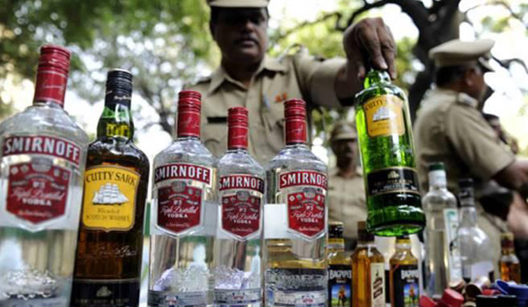 People line-up as liquor shops open from today in Bengaluru