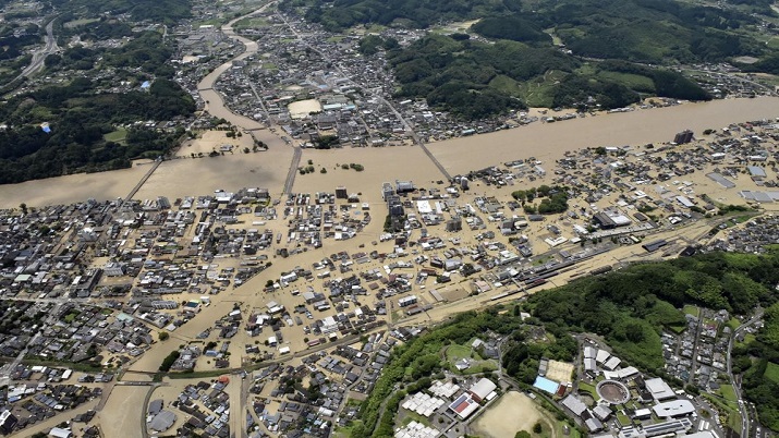 Heavy rain floods southern Japan; over a dozen presumed dead