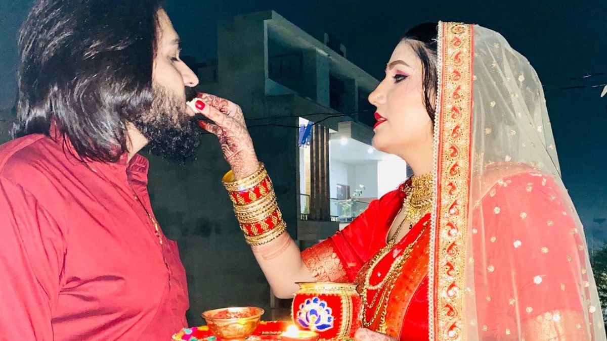 Sapna Choudhary shares FIRST PICS with husband Veer Sahu on Karwa Chauth,  stuns in red outfit | Celebrities News â€“ India TV