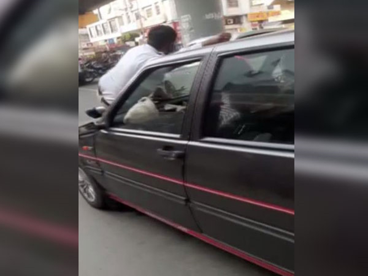 Pune man drags traffic cop on car bonnet to evade fine for not wearing mask. Watch Video