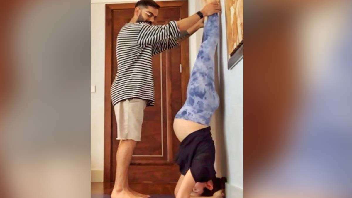 This pic of Virat Kohli helping pregnant wife Anushka Sharma do yoga will win your hearts