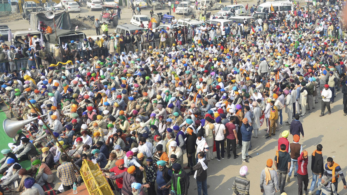 Farmers stage a protest at Singhu border during their Delhi Chalo march against the Centres new farm laws