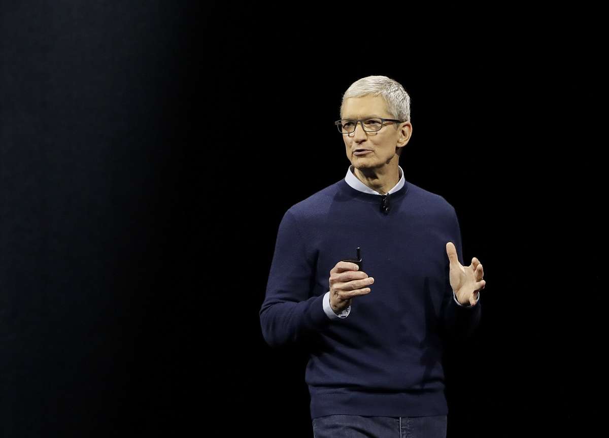 Tim Cook salary pay up 40% 2020 Apple market cap – India TV