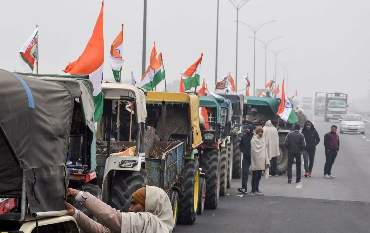 New Delhi: Tractors lined up on the KMP expressway as farmers gear up for their Jan 26 tractor rally in Delhi, as part of the ongoing agitation against farm reform laws, near New Delhi