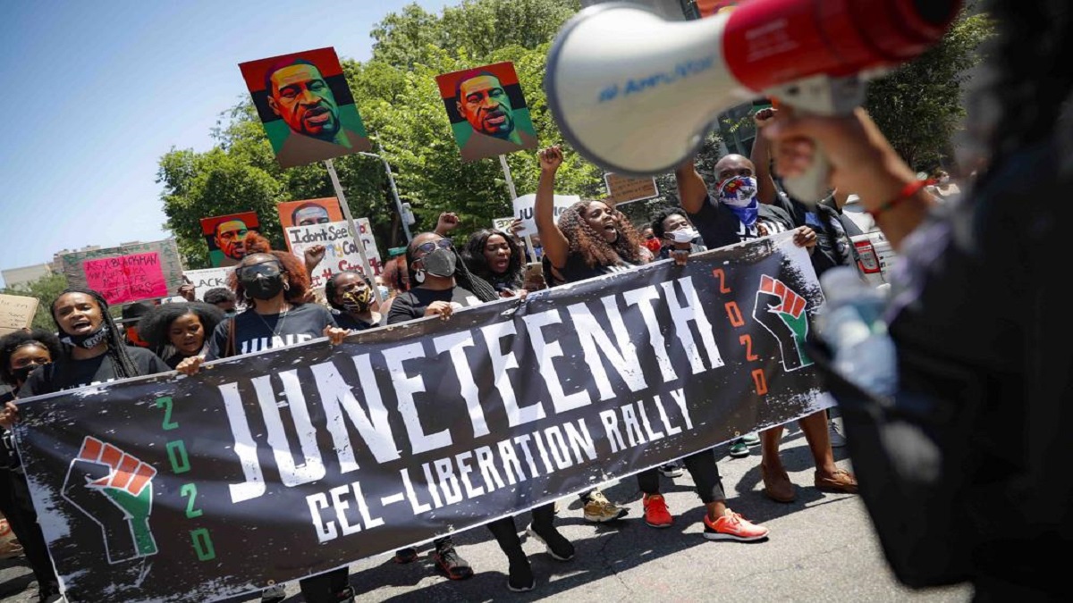 Black Americans laud Juneteenth holiday, say more work ahead