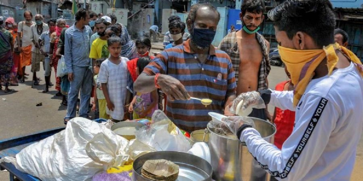 BJP leaders distribute dry ration in Delhi locality to mark 7th anniversary of Modi govt