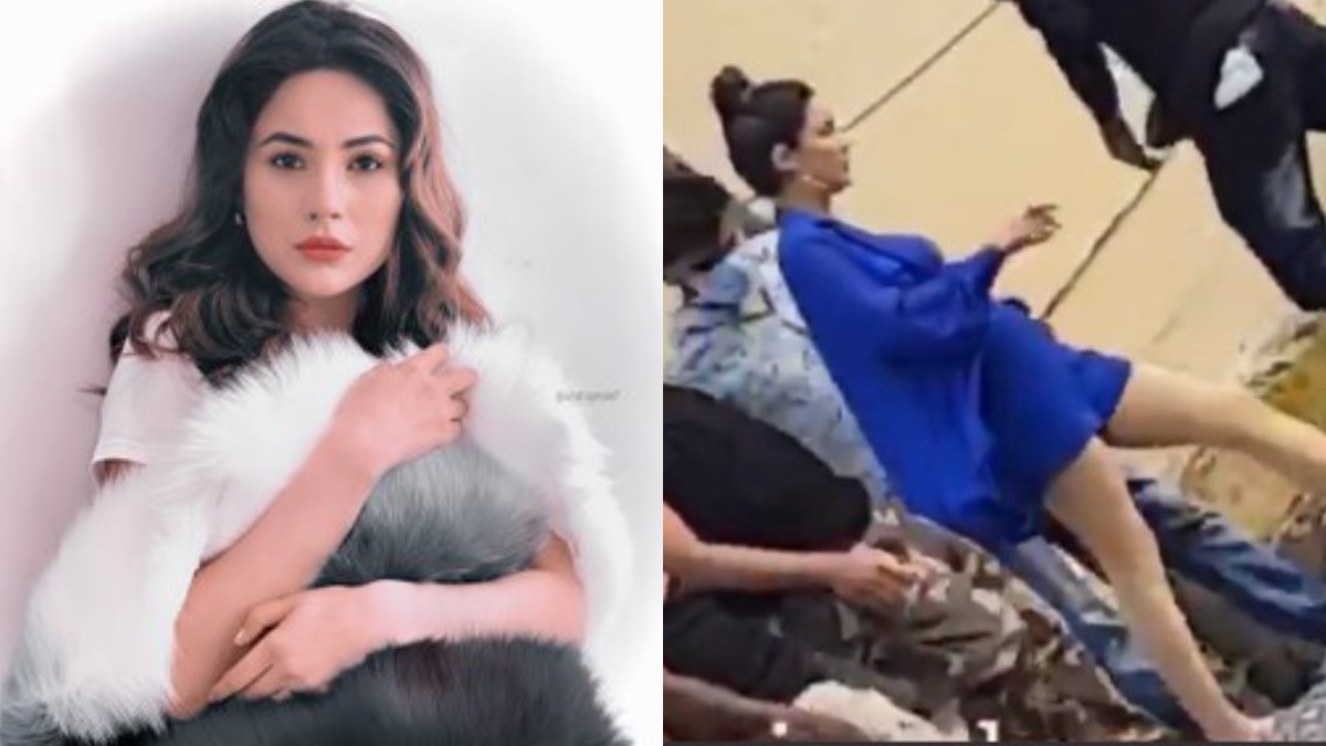 Shehnaaz Gill brutally trolled after video of her assistant making her wear footwear goes viral