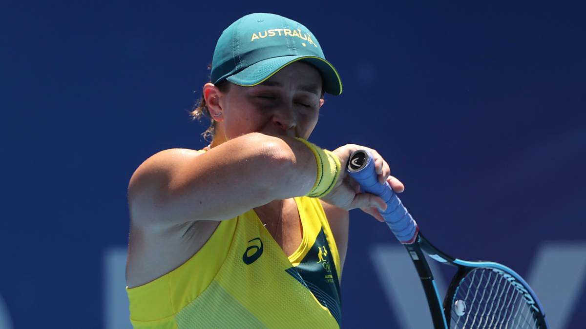 Ashleigh Barty feels the heat during her first round match against Sara Sorribes Tormo of Team Spain on Sunday.