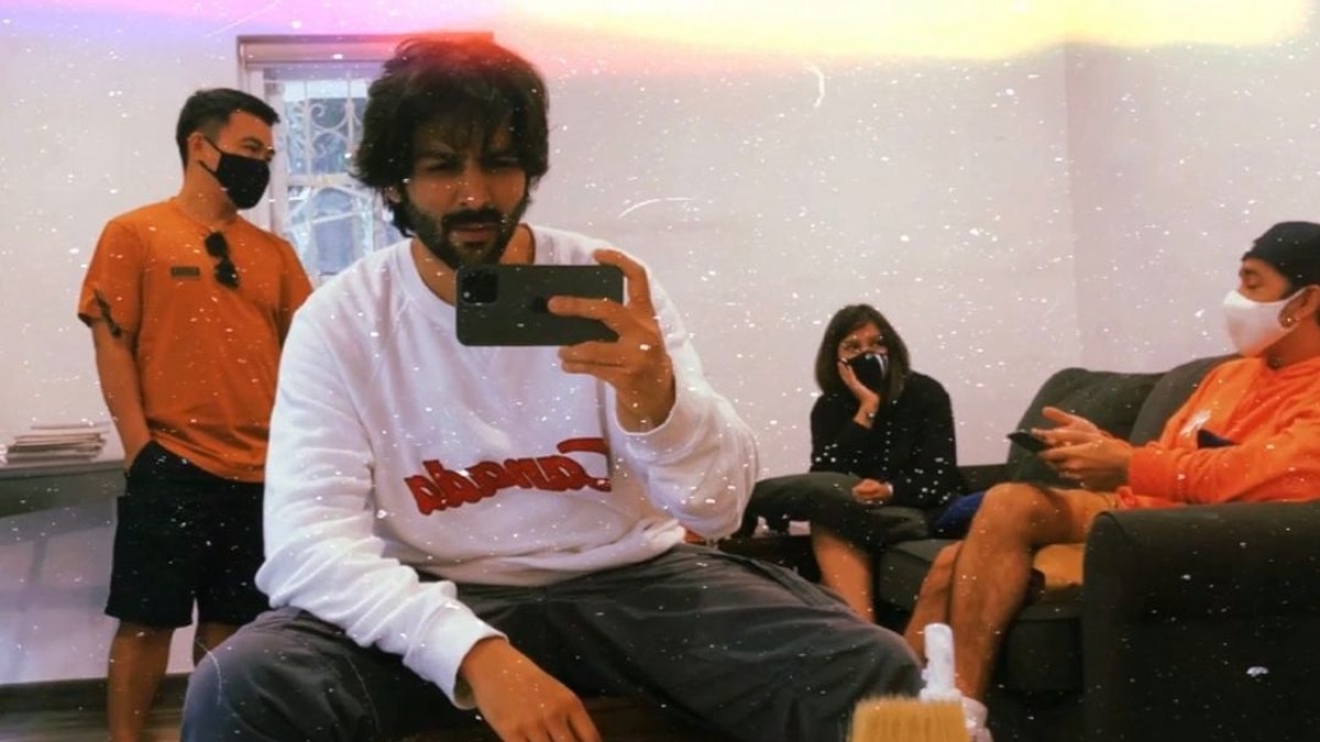 Kartik Aaryan gives sneak peek into his new look, fans wonder if it's for upcoming project; see pic