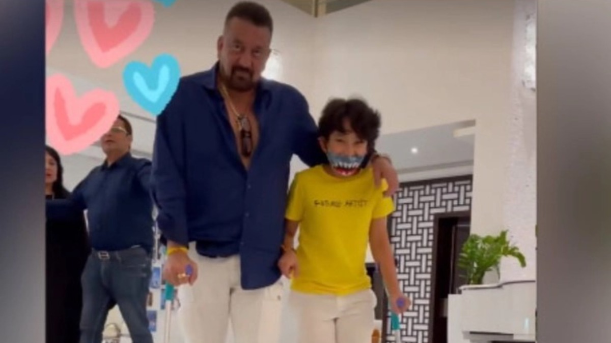 Maanayata captures Sanjay Dutt, son Shahraan walking hand in hand while recovering from leg injury | VIDEO