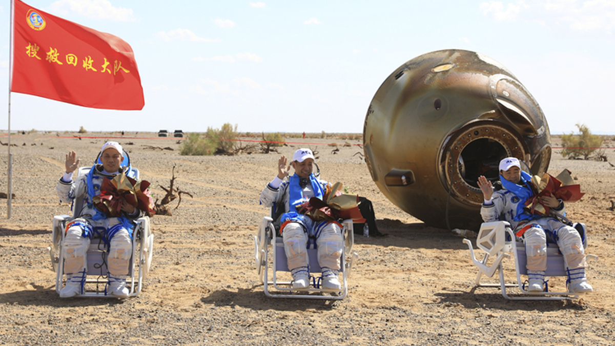 China astronauts return after 90 days aboard space station