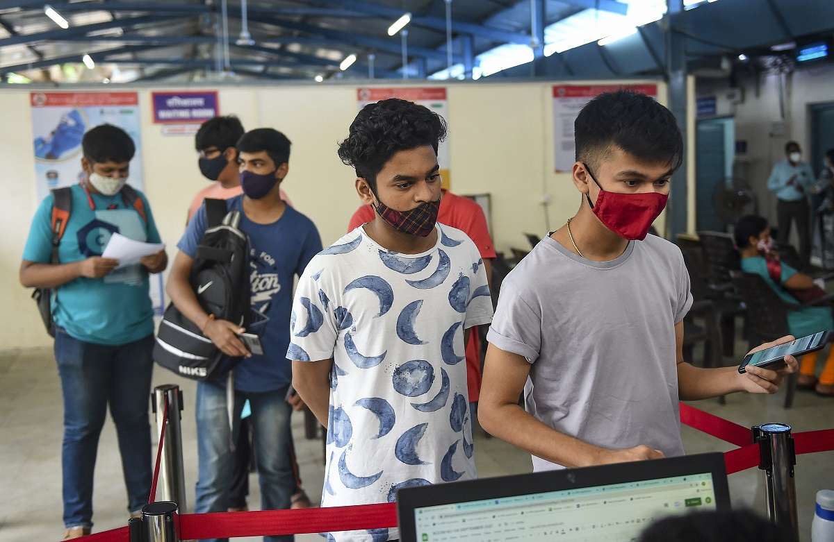 Mumbai: Youngsters stand in a queue to receive a dose of Covid-19 vaccine during a special vaccination drive for teachers and students