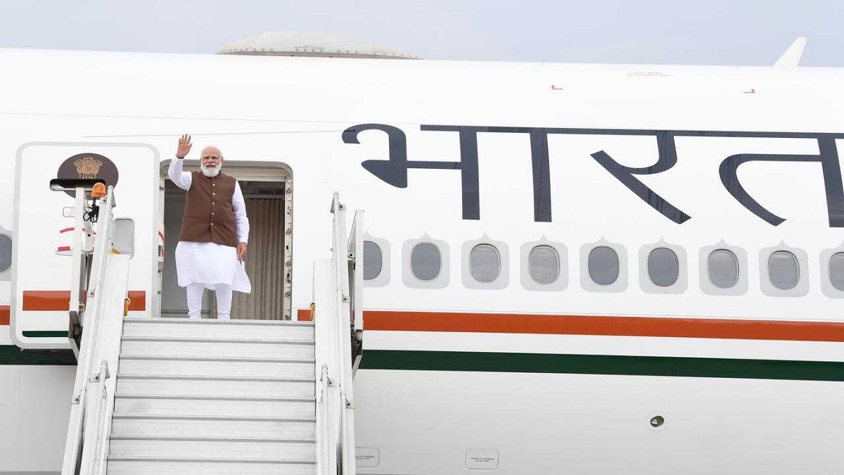 Prime Minister Narendra Modi waves to media contingent as he leaves for US visit.