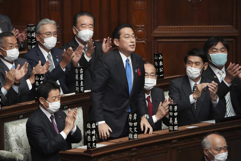 Japan's Parliament elects former diplomat Fumio Kishida as new Prime Minister