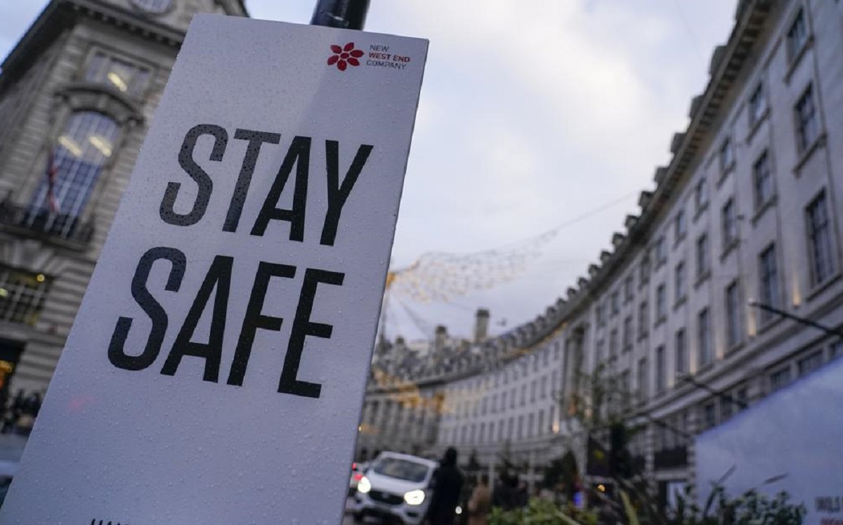 A sign reading 'Stay safe' in Regent Street, in London, Friday, Nov. 26, 2021