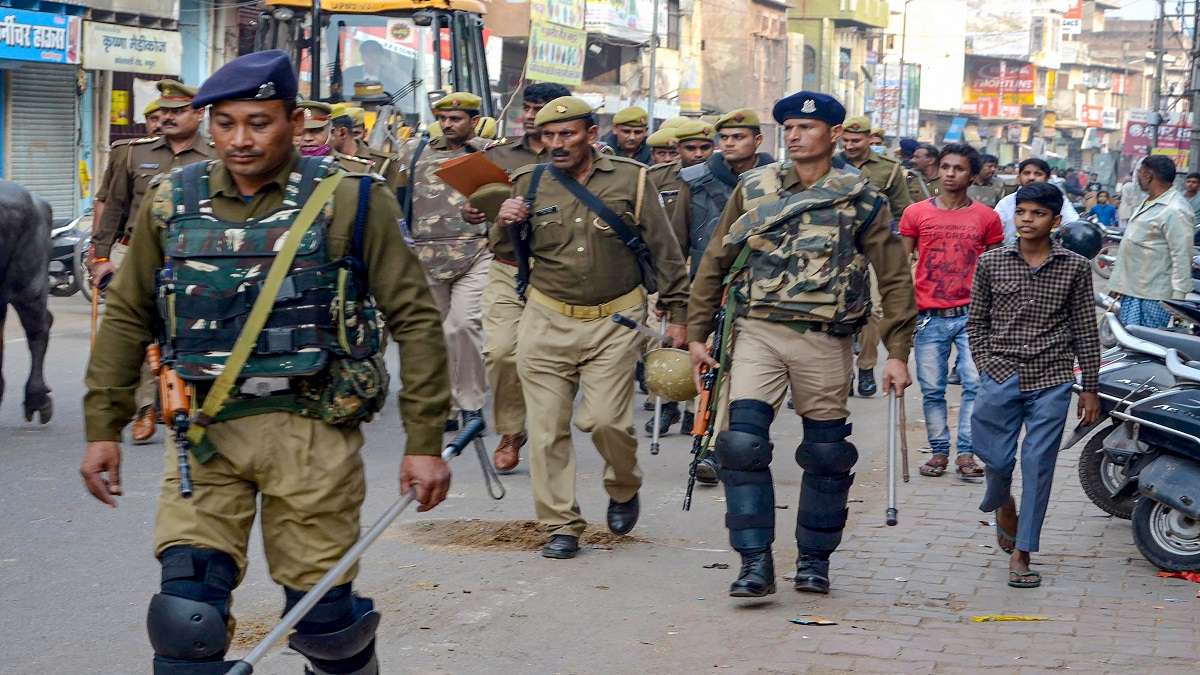 Security personnel conduct flag march after some right-wing groups threatened to install an idol of Lord Krishna inside the Shahi Idgah mosque.&nbsp;
