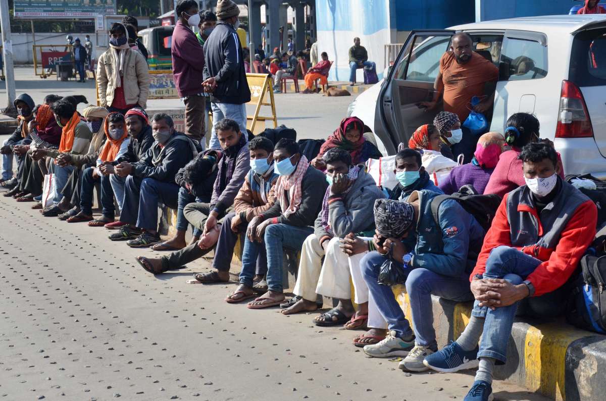  Passengers wait for their connecting trains outside a railway station. (Representative image)