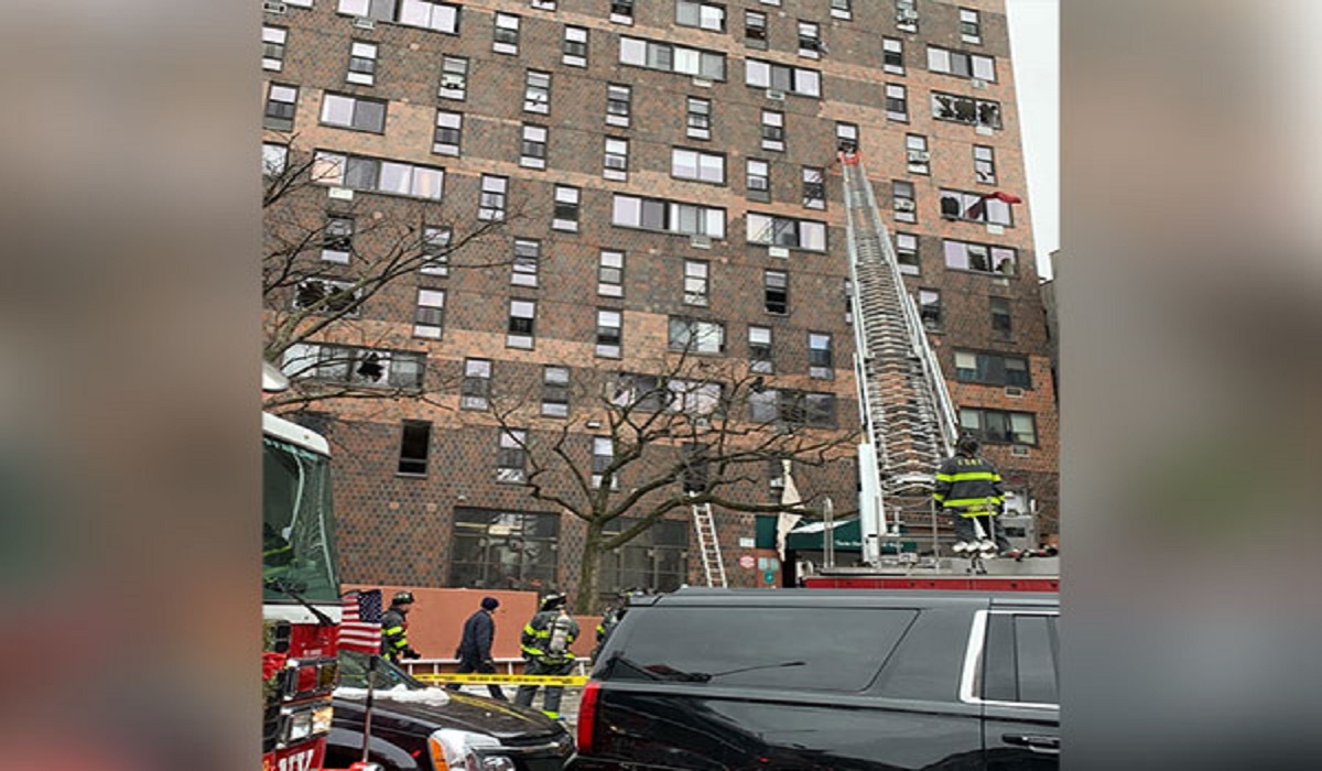 Nine children among 19 dead in massive fire at New York building