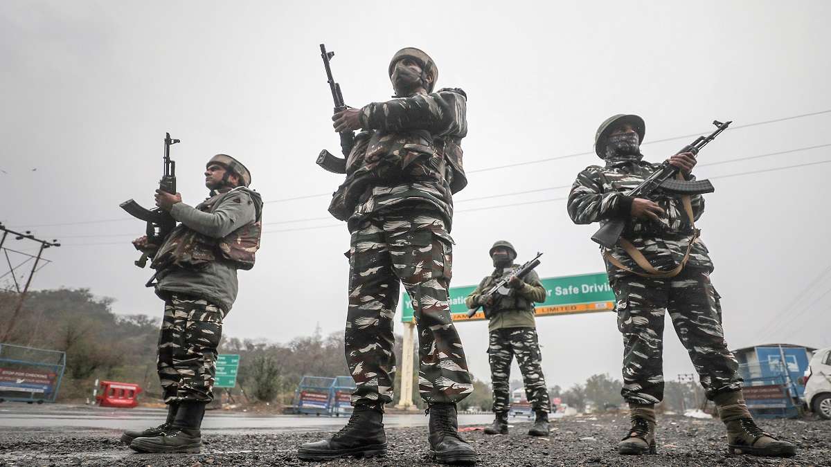 Central Reserve Police Force (CRPF) personnel keep vigil at Jammu-Kashmir national highway, ahead of the Republic Day.