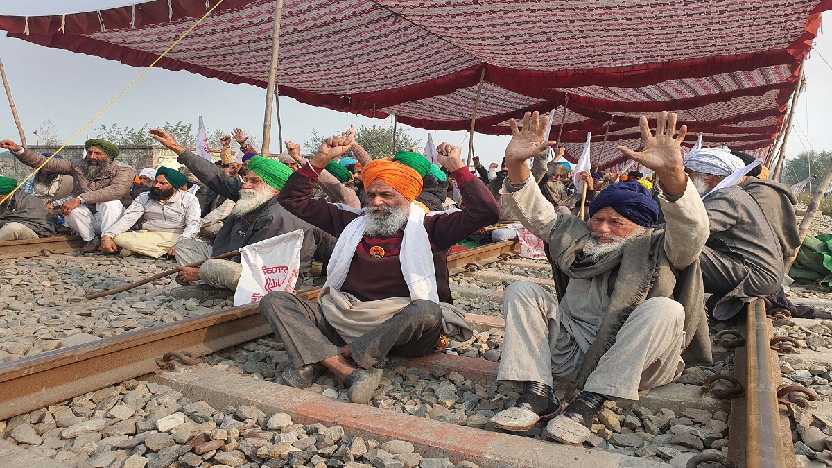 Amritsar: Farmers shout slogans as they block a railway track to protest against the state government for their various demands.