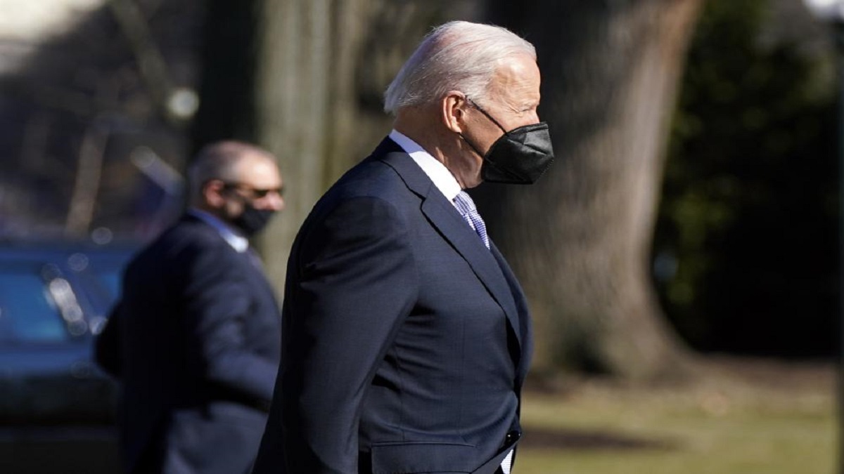 Joe Biden walks to board Marine One on the South Lawn of the White House, Friday, Feb 11, 2022, in Washington to travel to Camp David, Md.&nbsp;