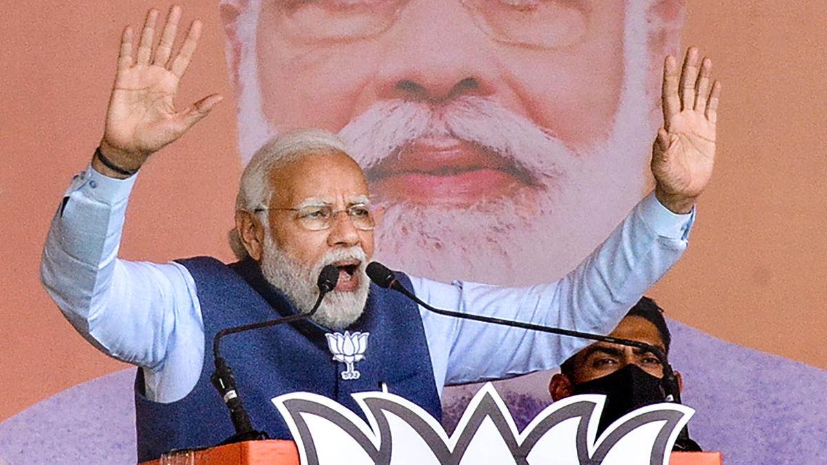Prime Minister Narendra Modi addresses an election rally at Akbarpur in Ambedkar Nagar district, Monday, Feb. 14, 2022.