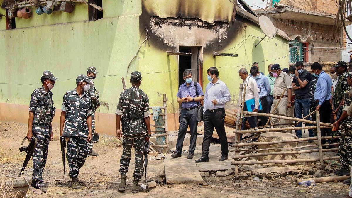 Central Bureau of Investigation (CBI) officers with CFSL team investigate near the house where eight people were burnt alive, at Bogtui village in Birbhum district of West Bengal.&nbsp;