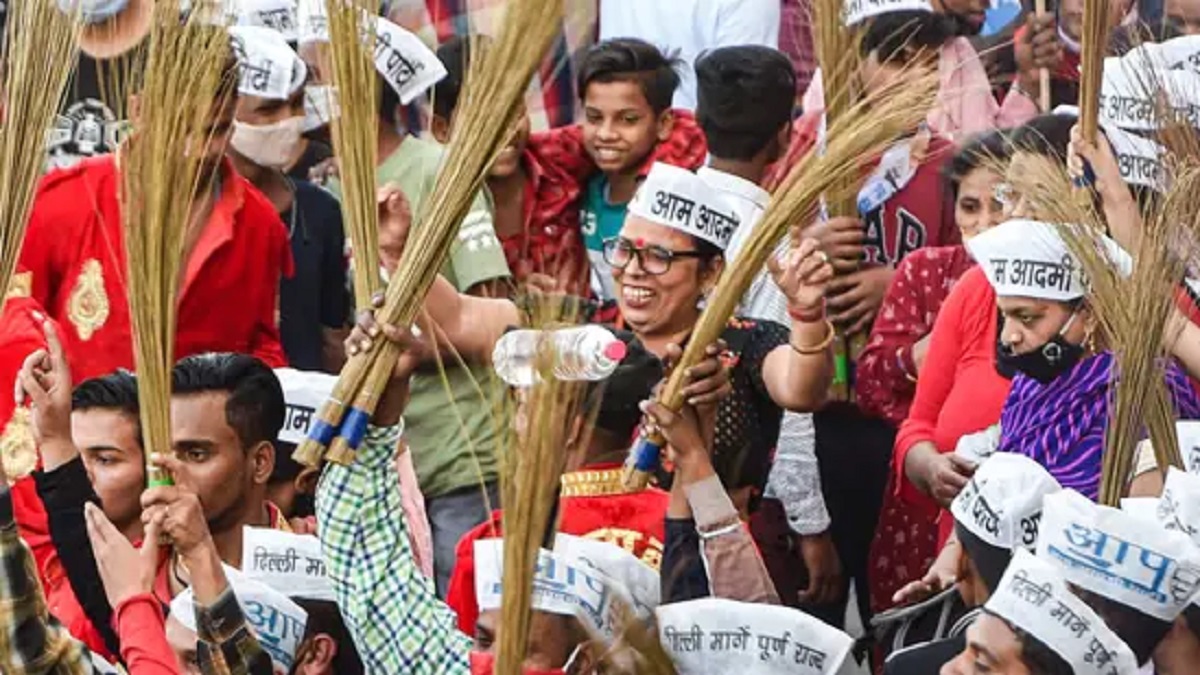 AAP supporters during party convenor and Delhi CM Arvind Kejriwal's roadshow for MCD by-elections in Shalimar Bagh village, New Delhi,