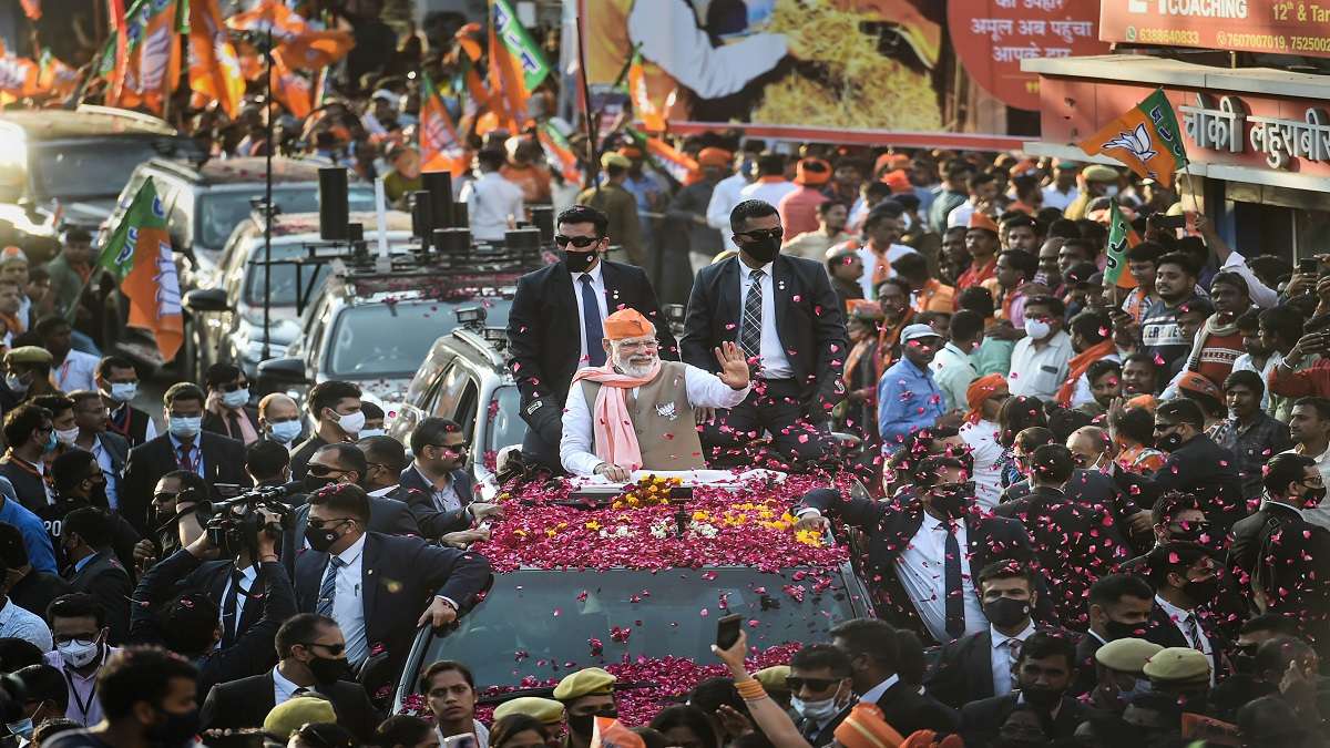 UP election: Sea of people accompanies PM Modi's mega roadshow in Varanasi | Watch