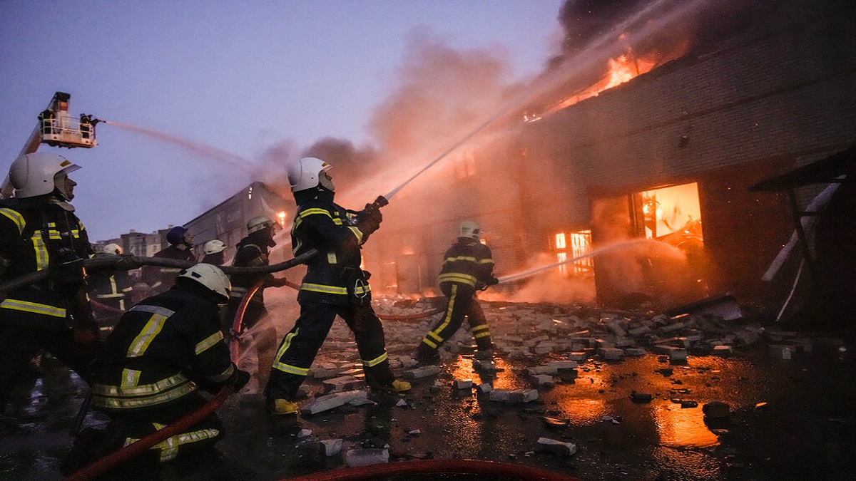 Ukrainian firefighters extinguish a blaze at a warehouse after a bombing in Kyiv, Ukraine.&nbsp;