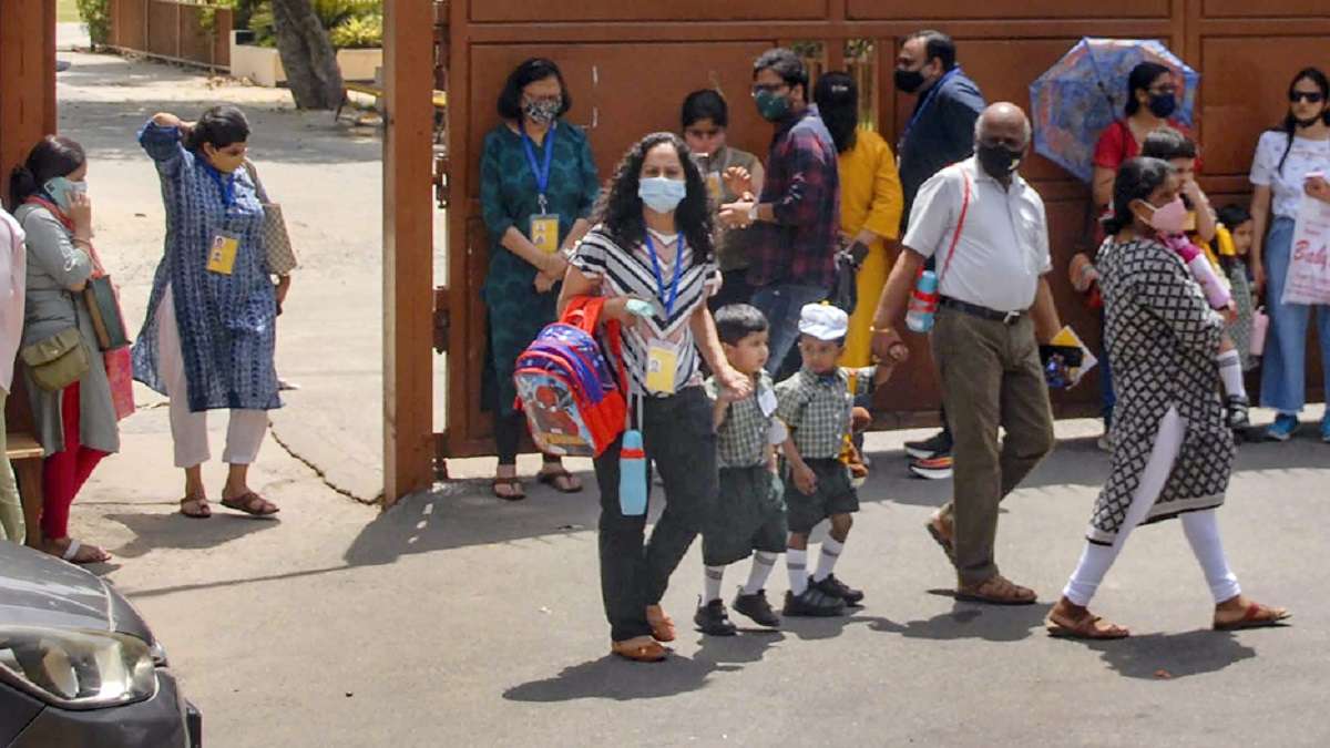 Parents in Noida protest against school fee hike in private schools, polish boots on roadside