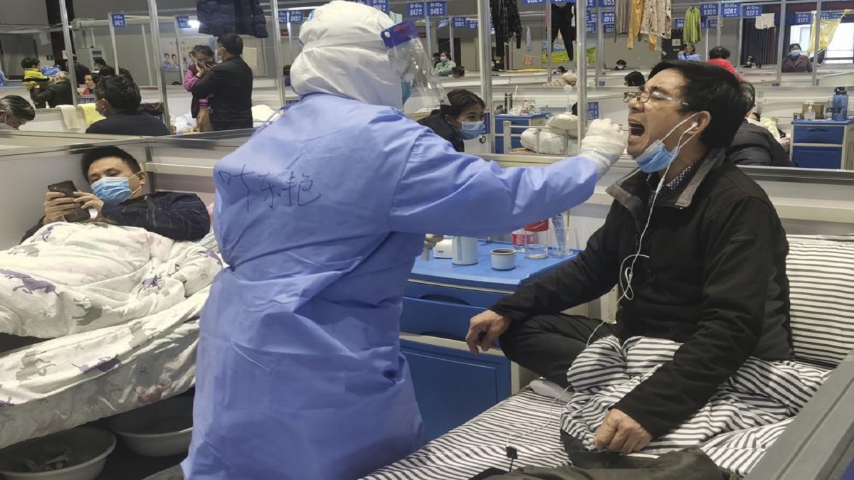 Residents get tested during their stay at a temporary hospital converted from the National Exhibition and Convention Center to quarantine COVID-positive people in Shanghai, China on Apr 18.&nbsp;