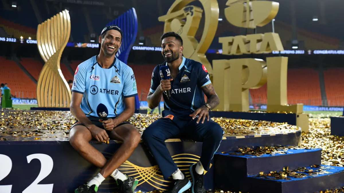 Gujarat Titans skipper Hardik Pandya along with coach Ashish Nehra are all smiles after winning the IPL 2022.&nbsp;