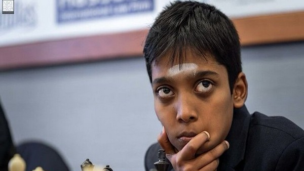 Praggnanandhaa and Carlsen's game ends in a draw; Coach Shyam defends his  ability to master precarious games