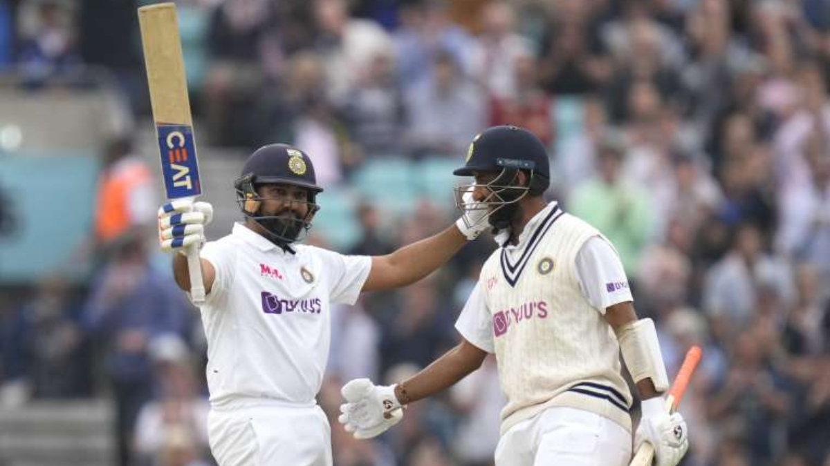 Rohit Sharma and Cheteshwar Pujara in action