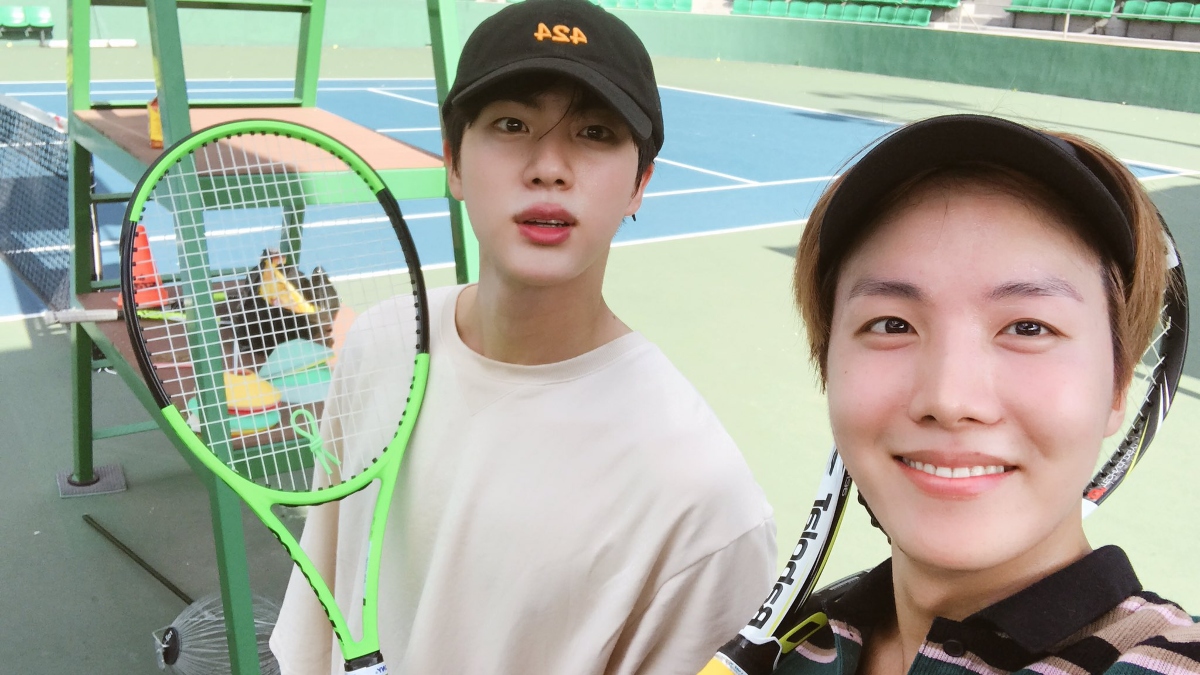 BTS star Jin showcases his sporty side while playing Tennis in costly  ensemble worth Rs 1,98,000