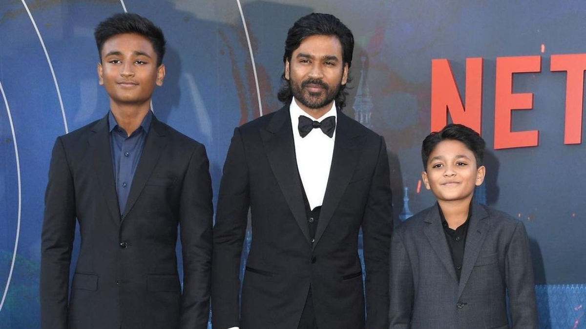 Dhanush attends The Gray Man premiere with sons Linga, Yathra. See