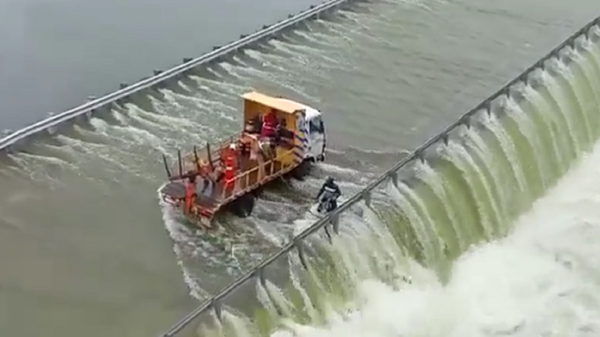 Telangana floods: Daring rescue of man on bike who was stuck on flooded Himayath Sagar bridge | WATCH