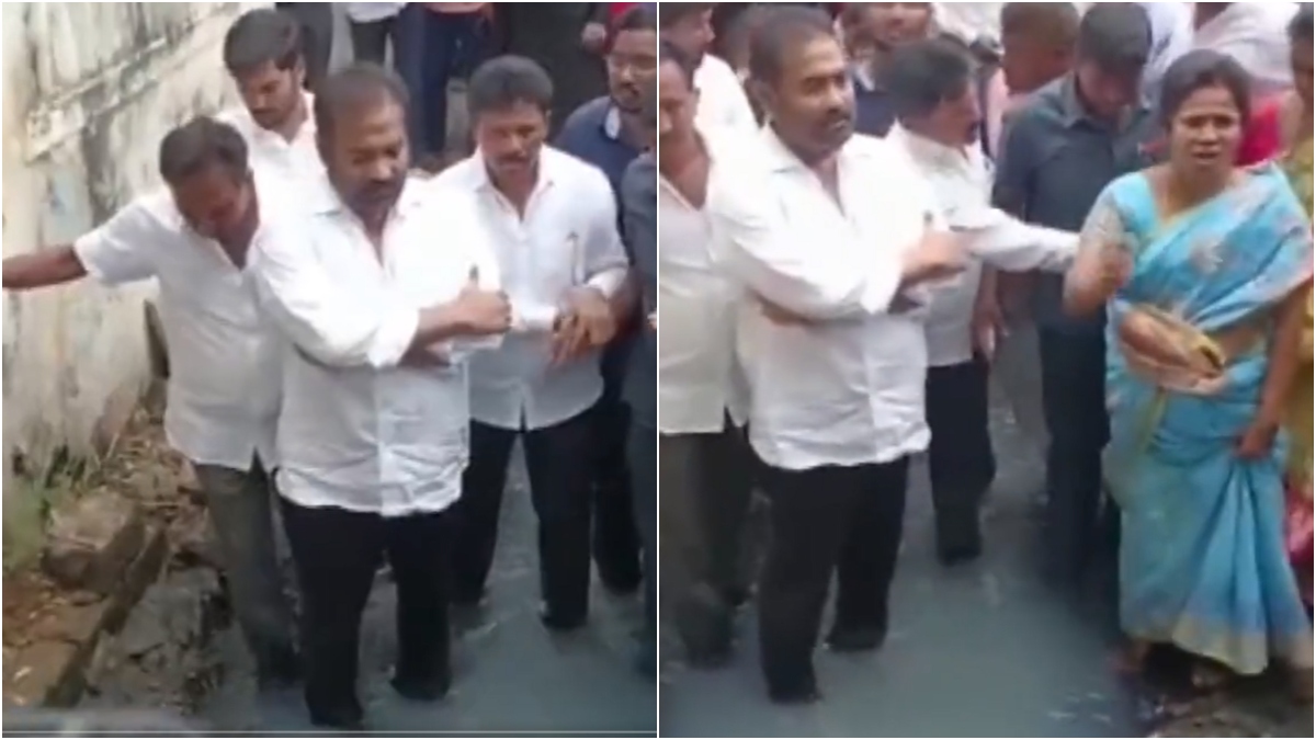 YSRCP MLA dips his legs in overflowing drain to protest against municipal officials | Watch