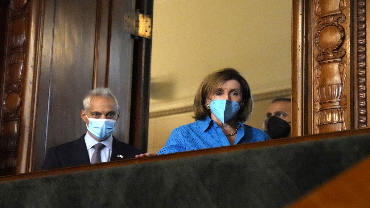 U.S. House Speaker Nancy Pelosi, center, with U.S. Ambassador Rahm Emanuel.