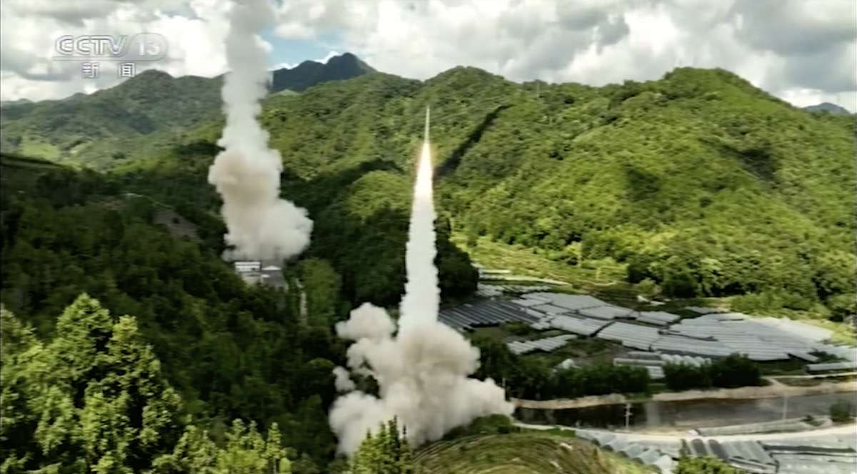 In this image taken from video footage run by China's CCTV, a projectile is launched from an unspecified location in China. 