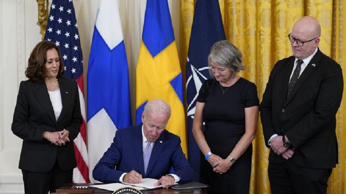 President Joe Biden signs the Instruments of Ratification for the Accession Protocols to the North Atlantic Treaty for the Kingdom of Sweden in the East Room of the White House in Washington, Tuesday, Aug. 9, 2022. 