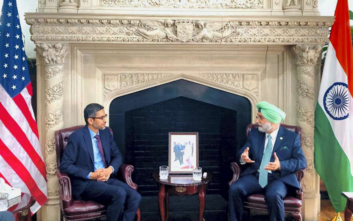 Google CEO Sunder Pichai with the Indian envoy in the US Taranjit Singh Sandhu, during his visit to the Indian embassy in Washington. 
