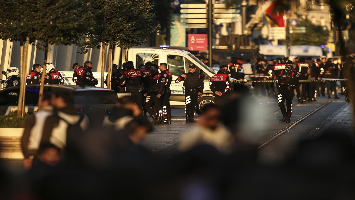 Security and ambulances at the scene after an explosion on Istanbul's popular pedestrian Istiklal Avenue, Sunday, Nov. 13, 2022.