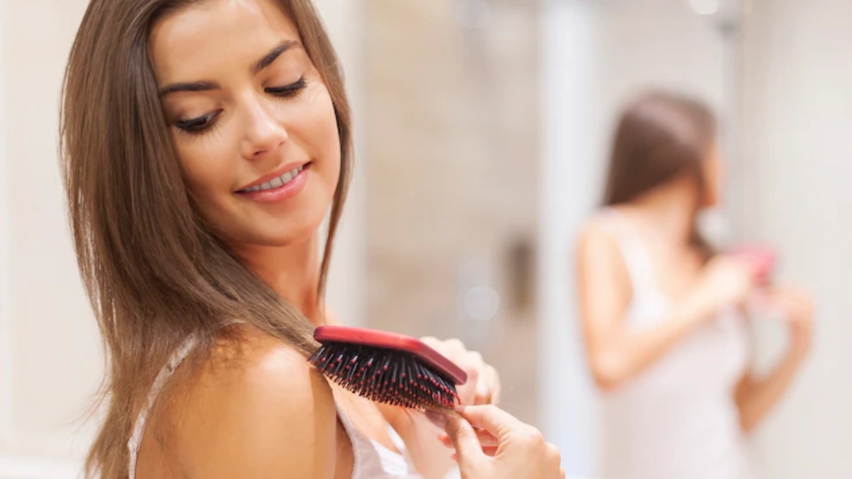 Representative image of a woman combing her hair