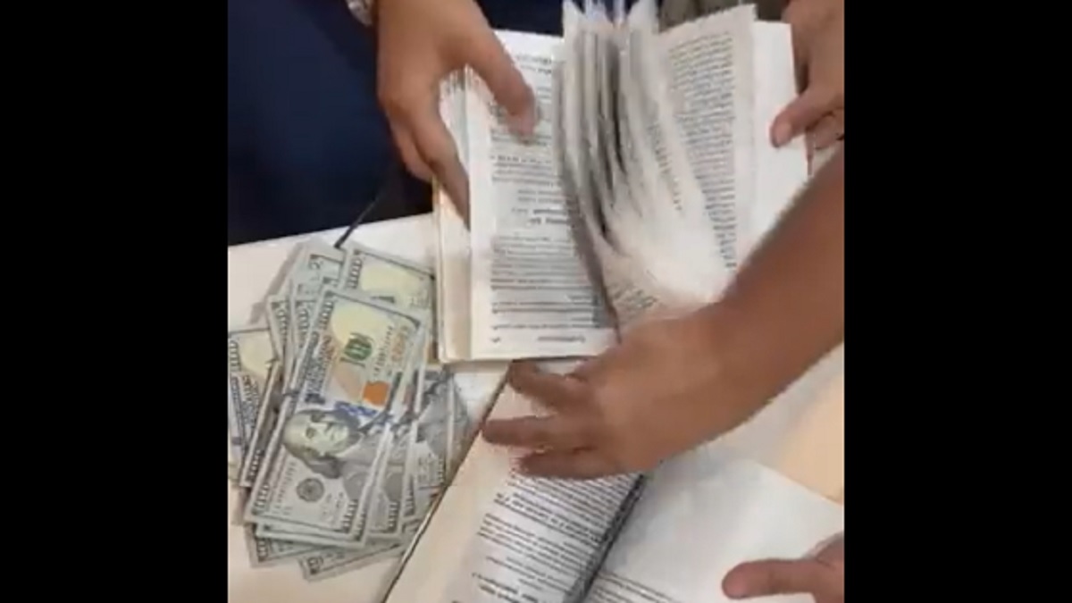 catatan mata uang bandara USD 90000 disita dari penumpang asing di dalam buku video viral