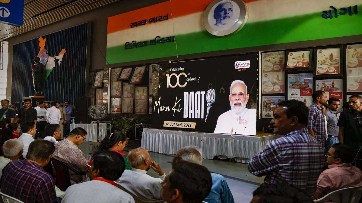 People listen to 100th episode of Prime Minister Narendra Modi's Mann Ki Baat radio programme in Ahmedabad.