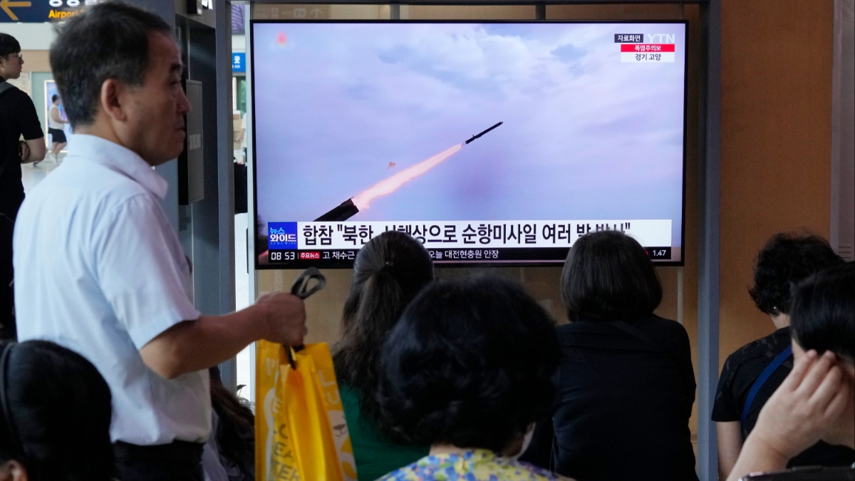 A TV screen shows a file image of North Korea's missile launch during a news program at the Seoul Railway Station in Seoul.