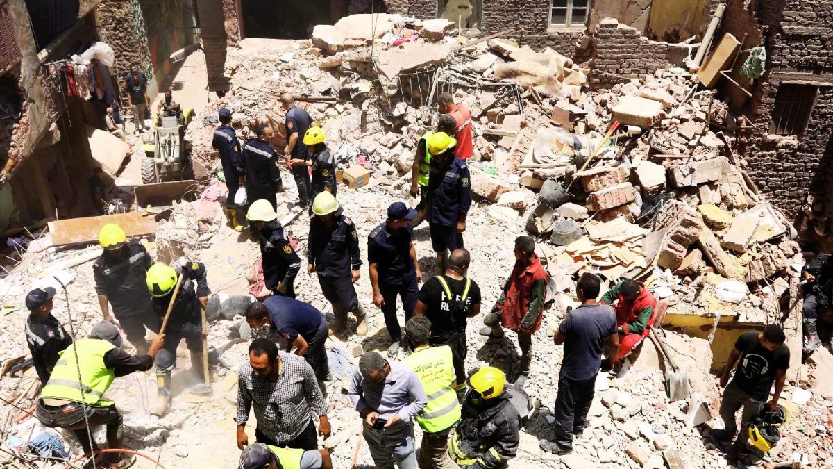 Cairo building collapse: 12 killed as residents removed number of walls for maintenance work