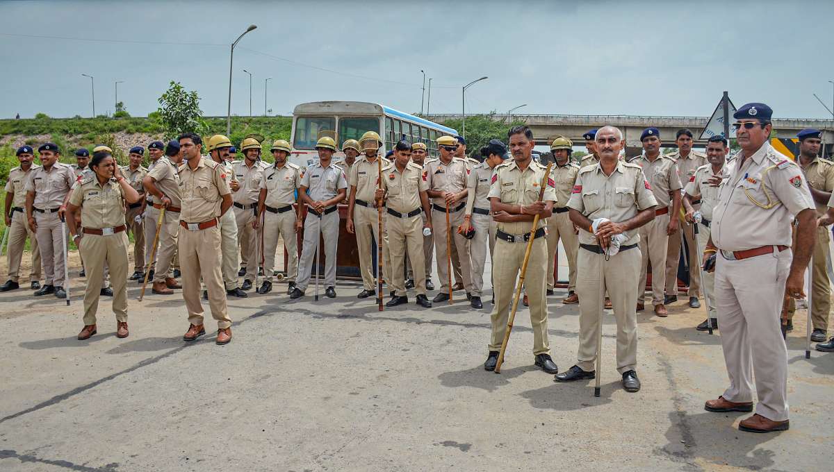 Heavy police deployment on the Gurugram-Nuh border near KMP Expressway in the violence-hit Nuh district on Aug 9